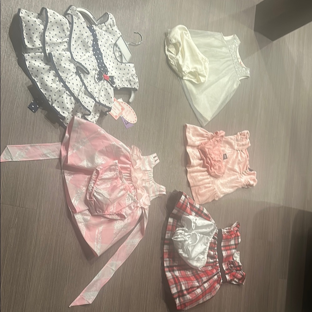 Assorted Baby Dresses and Outfits
